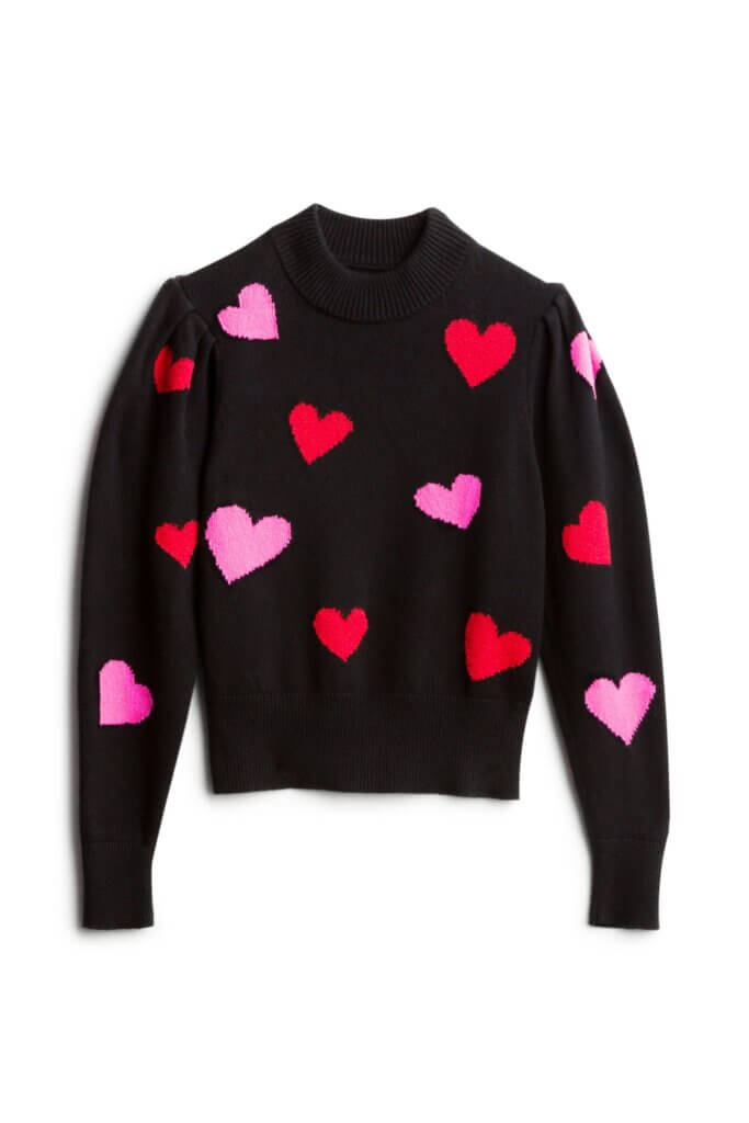 Stitch Fix women's black sweater with pink and red hearts.