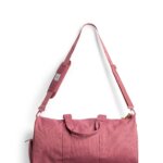 Stitch Fix women's pink duffle bag.