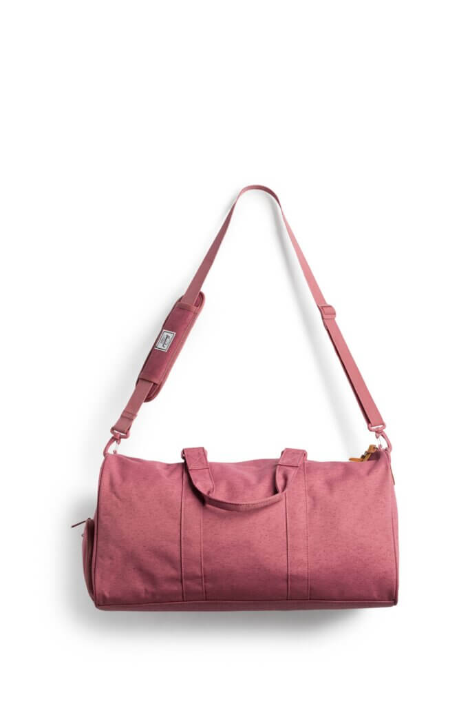 Stitch Fix women's pink duffle bag.