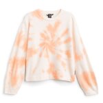 Stitch Fix women’s essential road trip packing list orange and white tie dye sweatshirt.