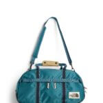 Stitch Fix women's green duffle bag.