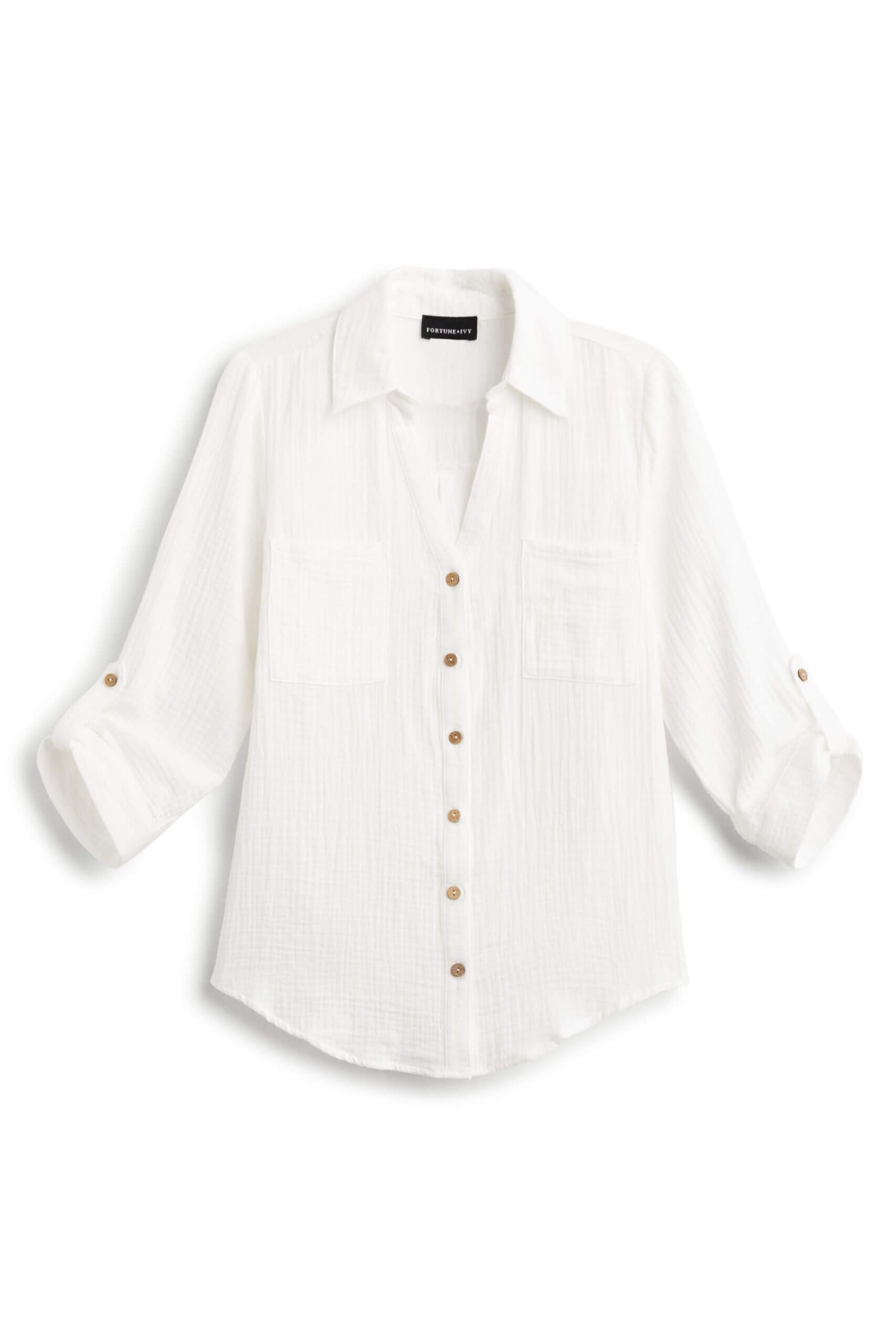 Stitch Fix women’s three-quarter sleeve white linen button-down top.