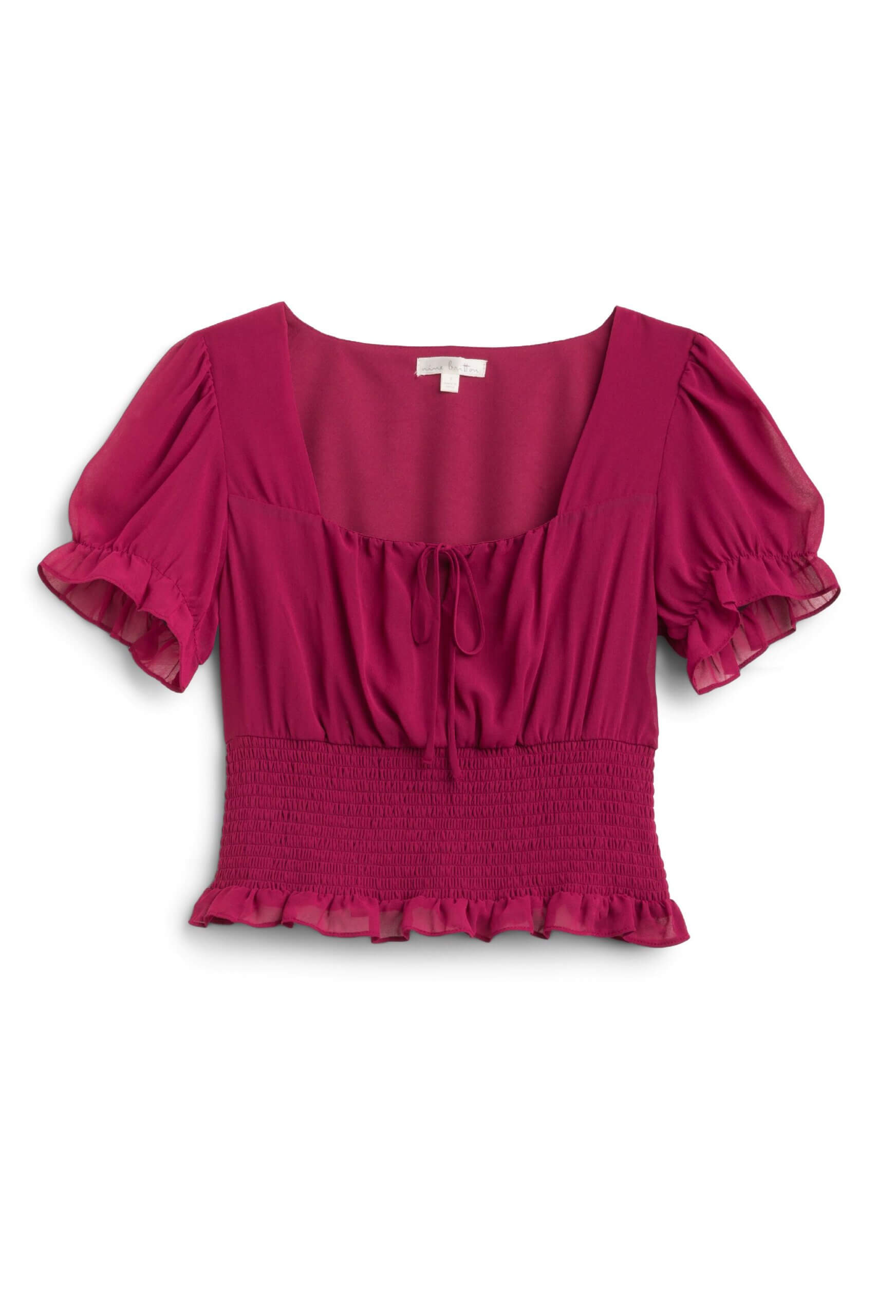 Stitch Fix women’s dark pink smock and ruffle blouse with puff sleeves.