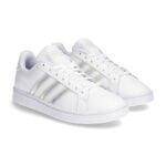 Stitch Fix women's white sneakers with silver stripe detailing.