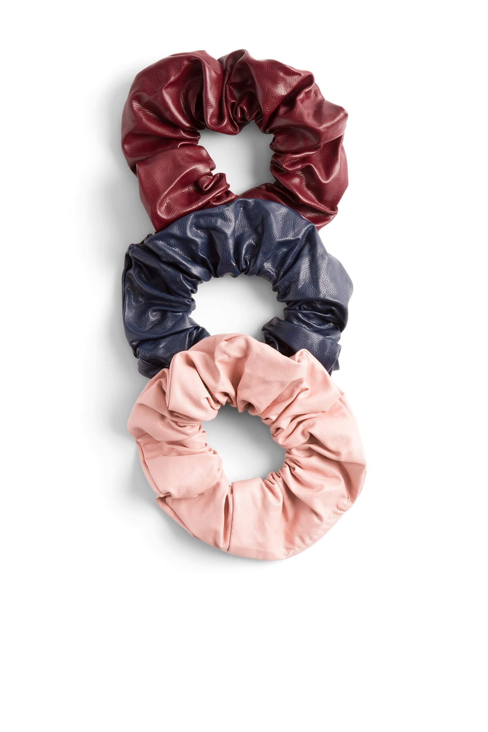 Stitch Fix women’s set of three burgundy, navy and pink leather scrunchies.