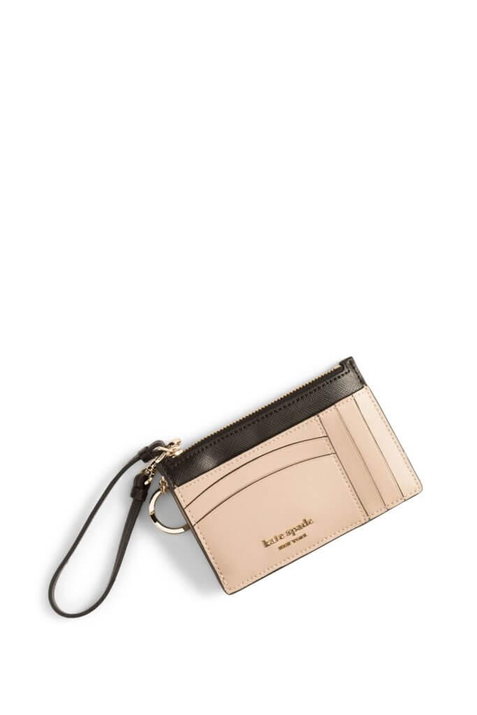 Stitch Fix women's beige and black clutch bag.