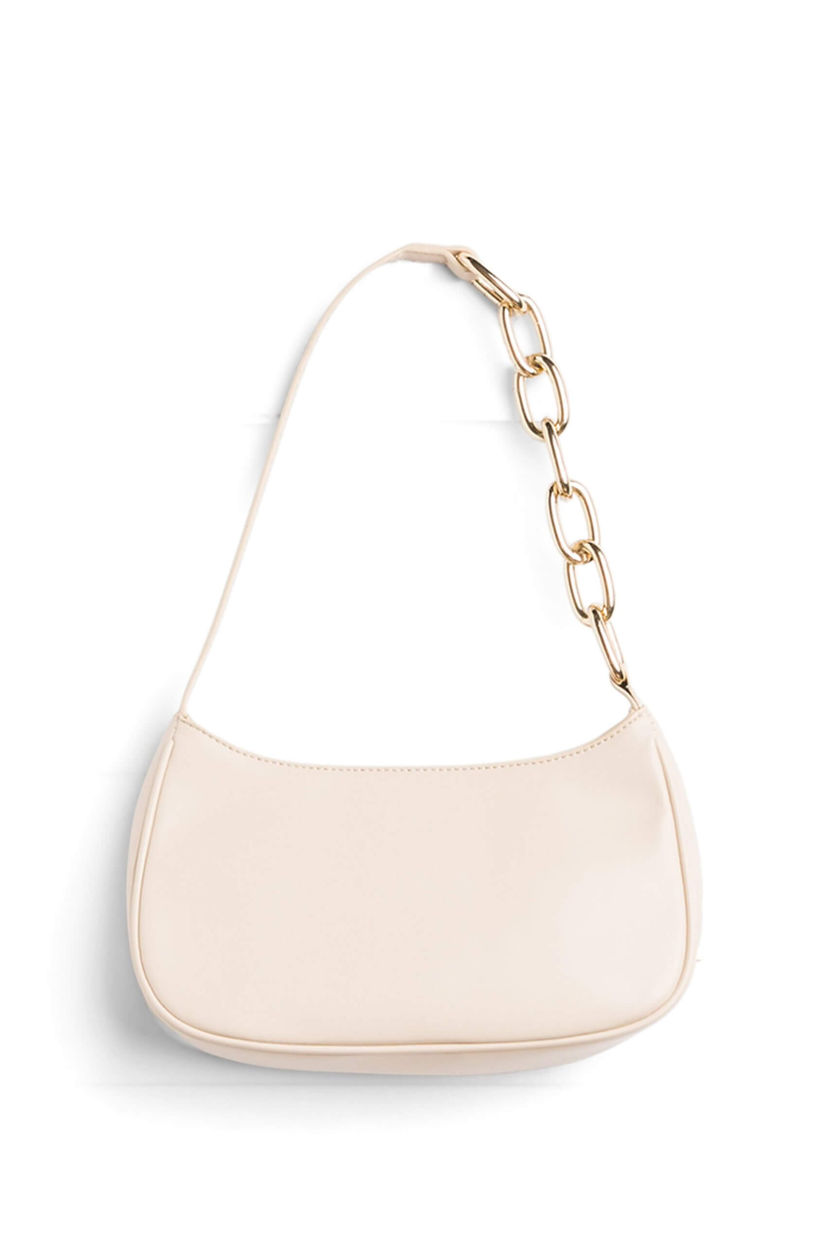 Stitch Fix women’s baby pink shoulder bag with large gold chain accent.