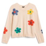 Stitch Fix women’s cream sweater with colorful flower detail.
