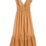Stitch Fix women’s orange v-neck maxi dress with ruffle sleeve trim.