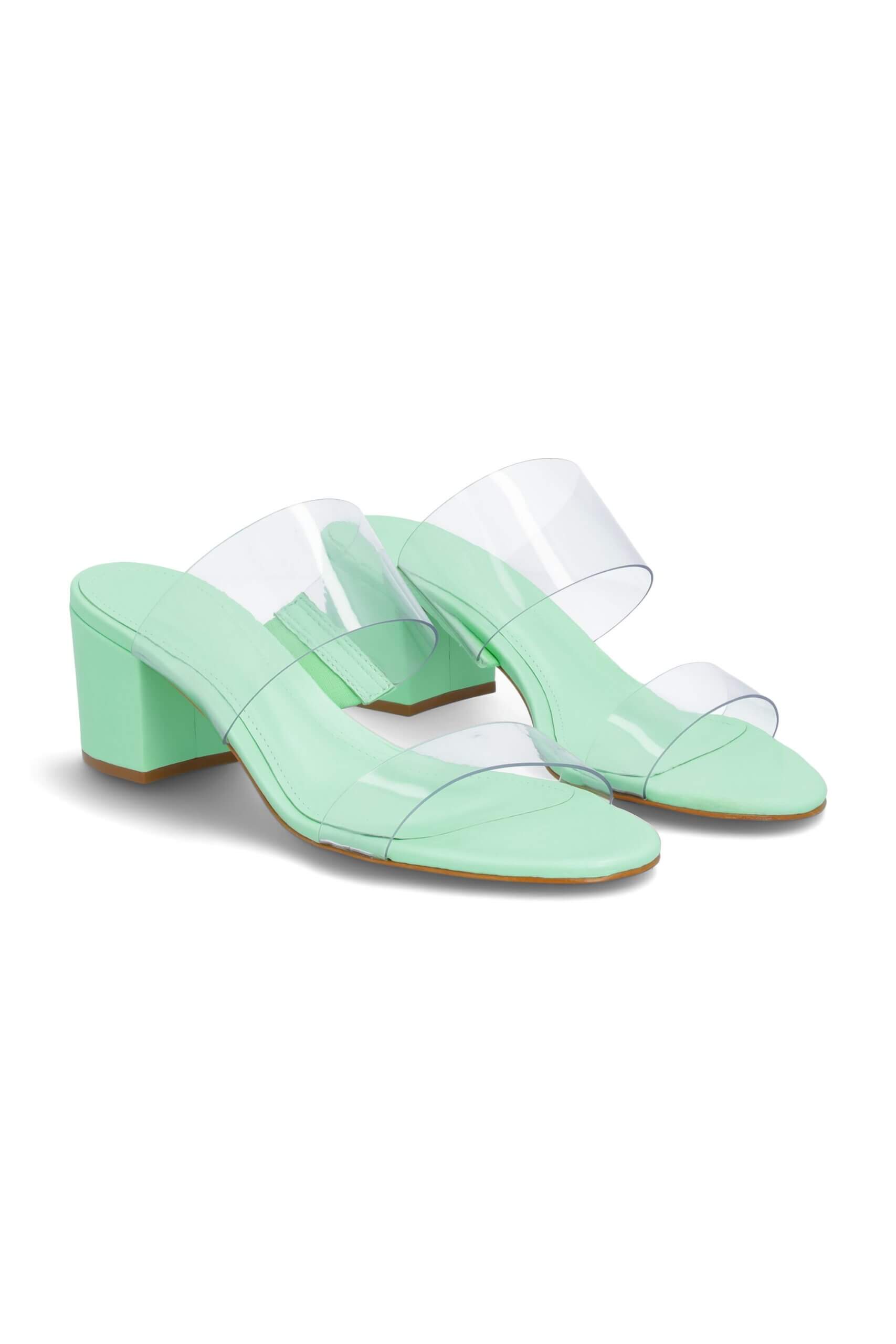 Stitch Fix women’s mint green slide heels with translucent straps.