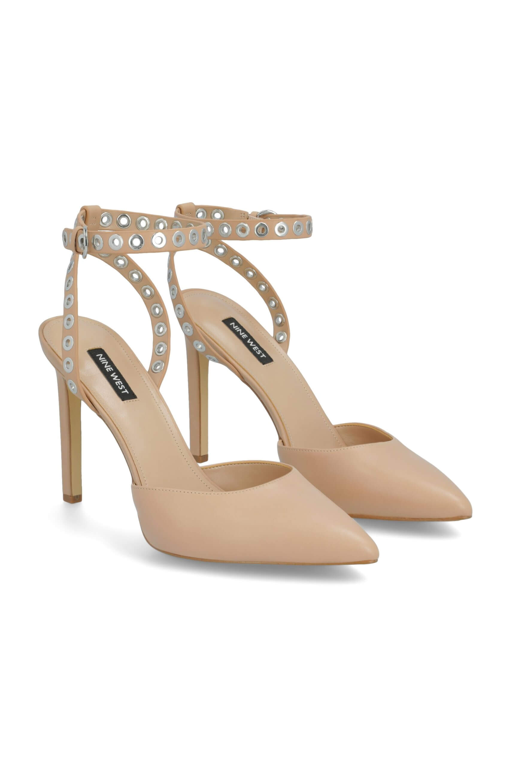 Stitch Fix women’s nude pointed-toe heels with grommet detail ankle straps.