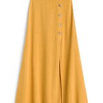 Stitch Fix women’s mustard yellow maxi skirt with button detail.