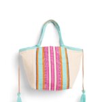 Stitch Fix women's beige tote bag with blue, pink and orange stripes.