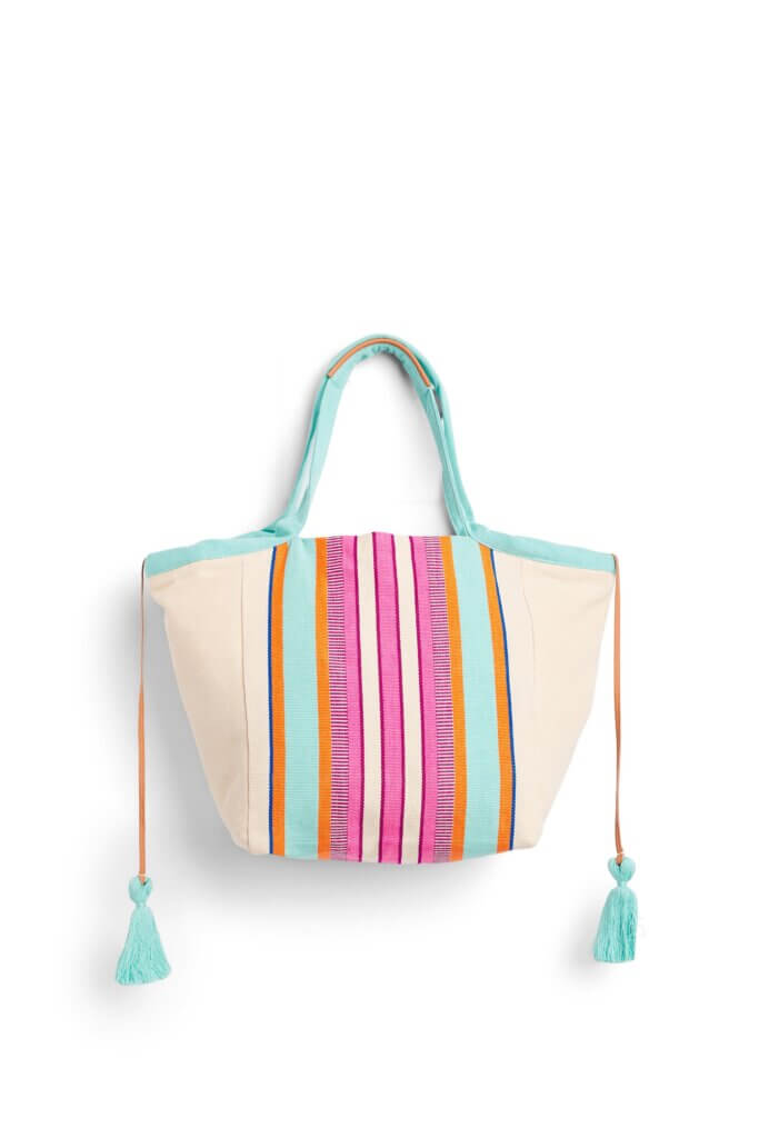 Stitch Fix women's beige tote bag with blue, pink and orange stripes.