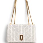 Stitch Fix women's white shoulder bag with gold chain detail.
