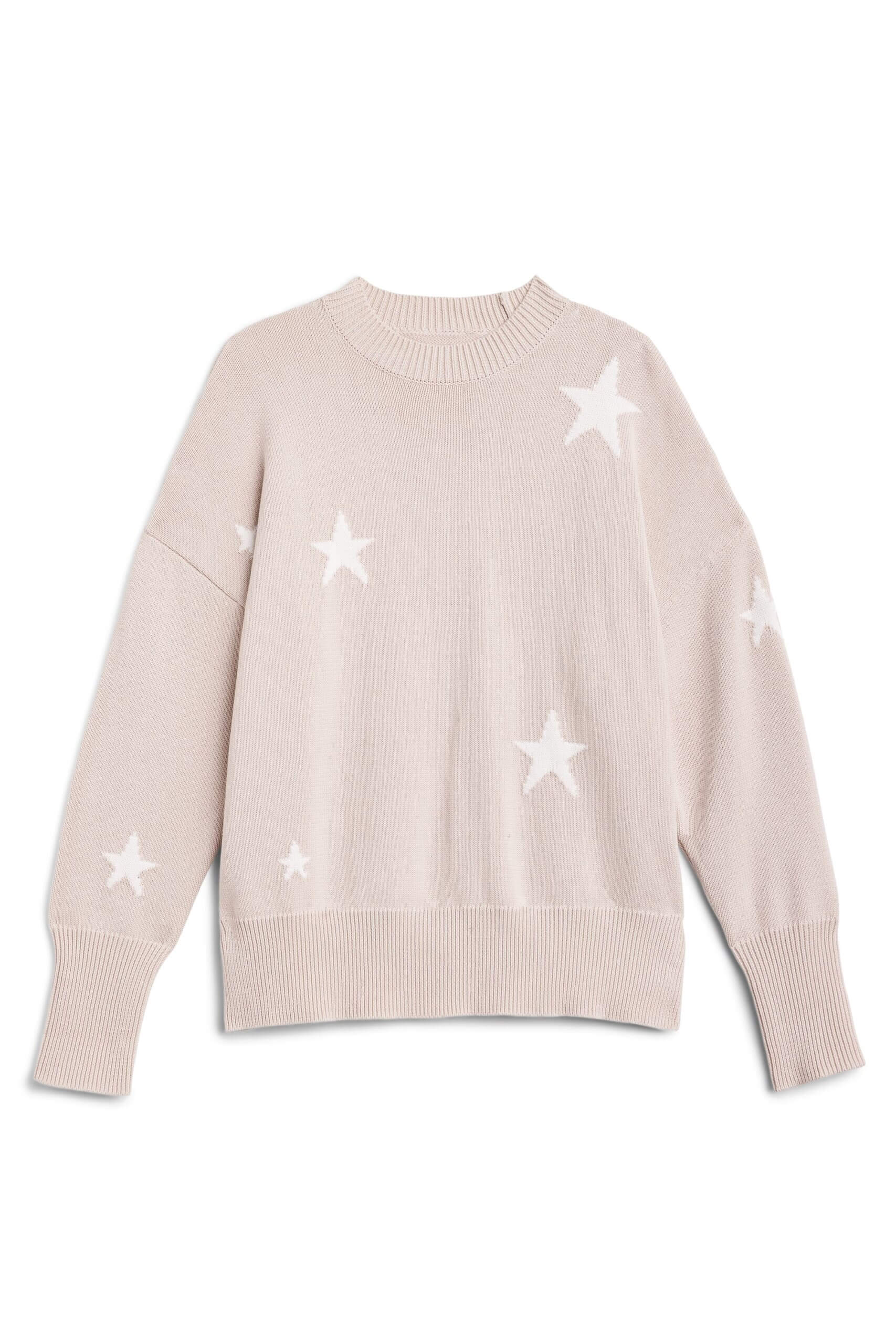 Stitch Fix women’s beige oversized pullover with white stars print.