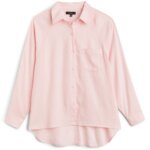 Stitch Fix women’s light pink long-sleeved button-down blouse.