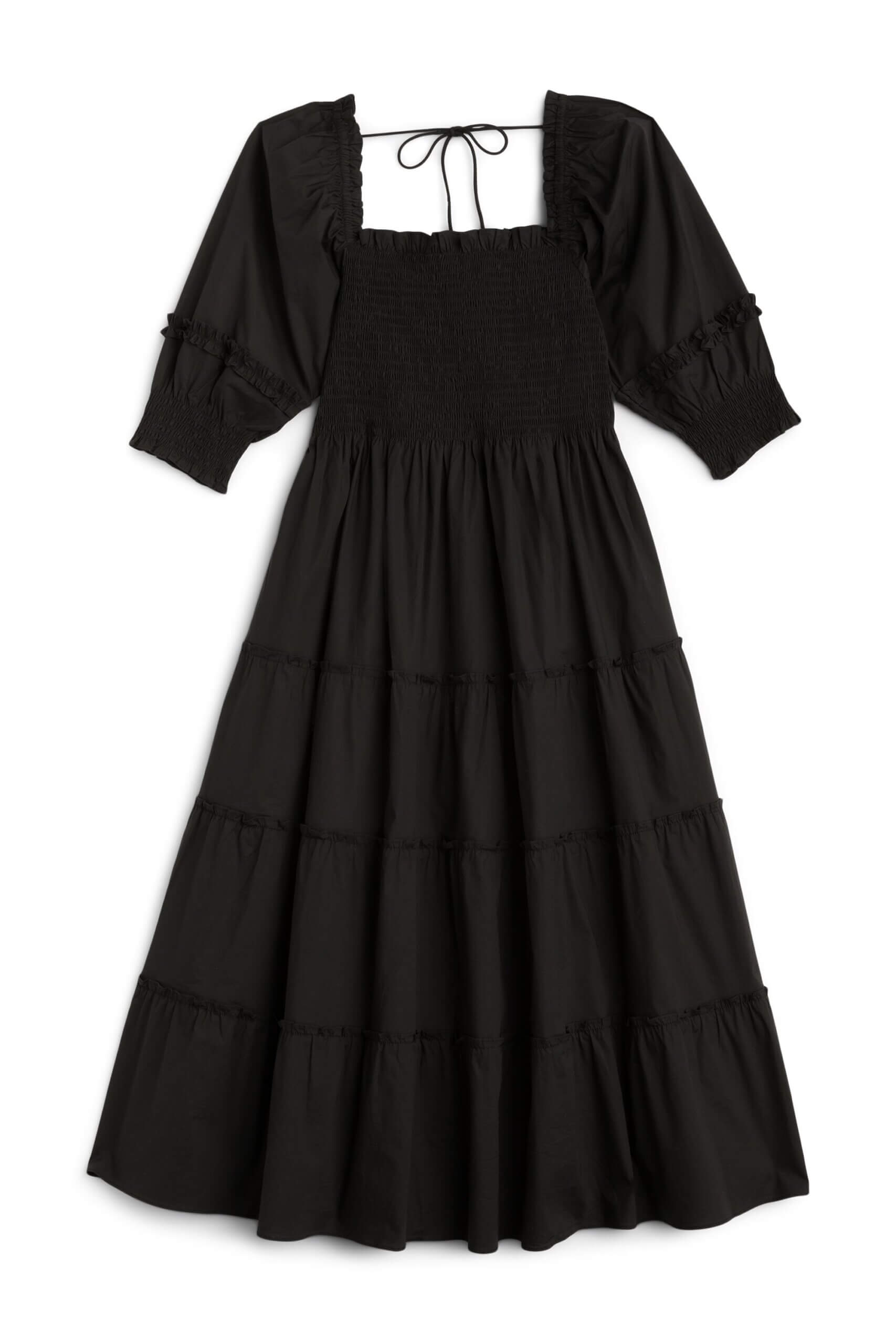 Stitch Fix Women's romantic style black tiered dress with puffed sleeves and smocked bodice.