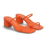 Stitch Fix women's orange heeled sandals.