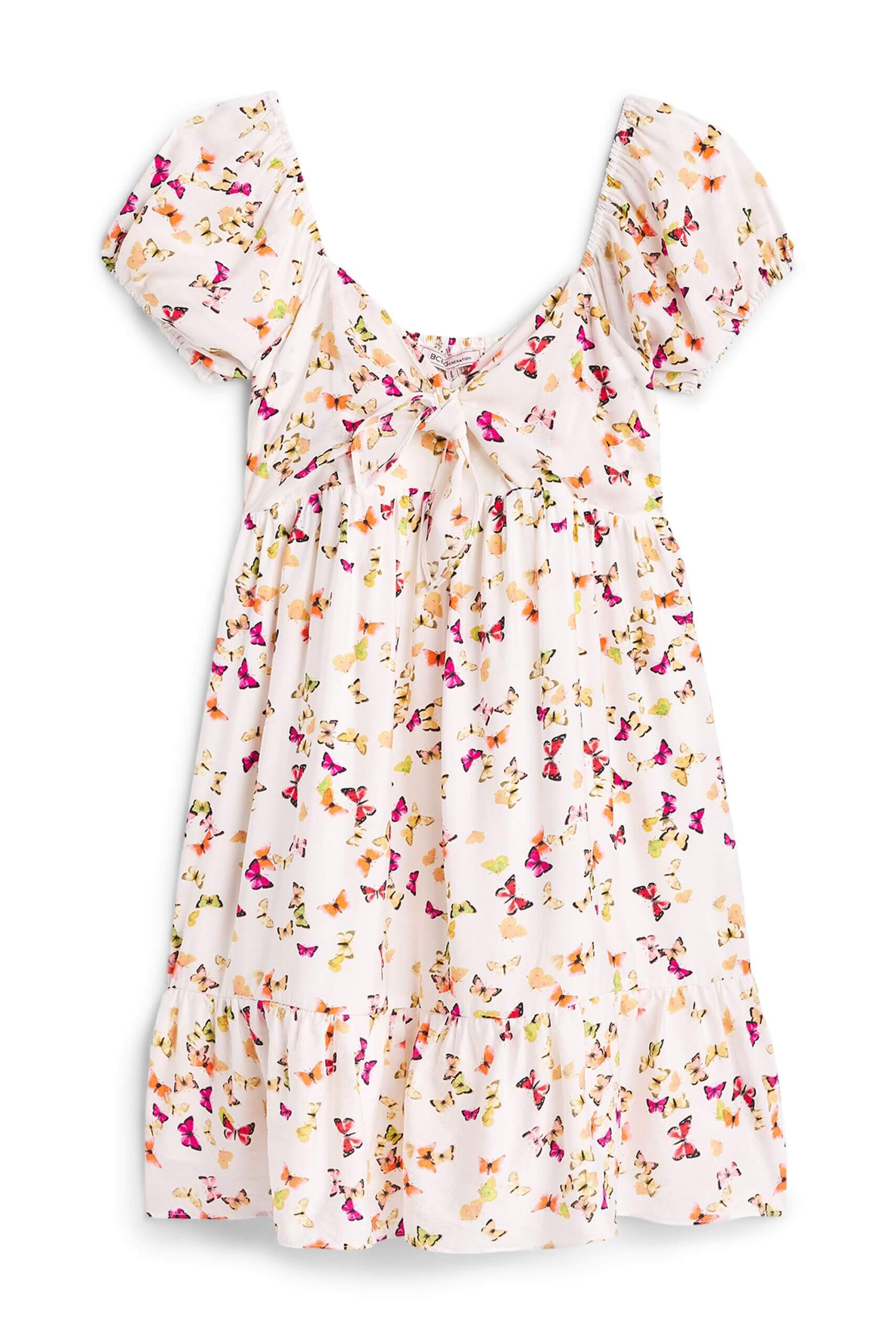 Stitch Fix Women's romantic style dress in butterfly pattern with short puffed sleeves and knot-front bodice.