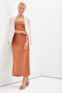 summer city wedding outfit with sheath, linen blazer, and dress