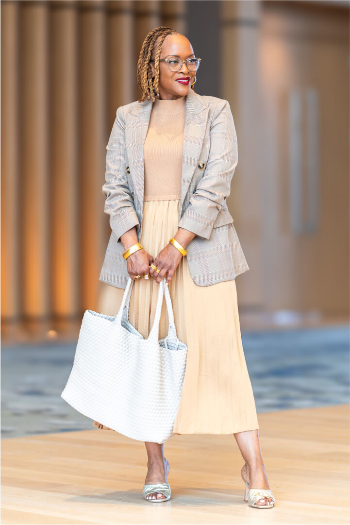 woman with oval shape body wearing suit pants and blazer with cotton shirt